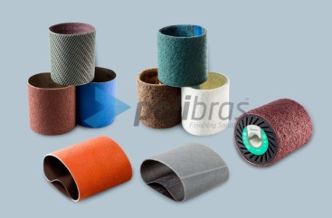 Cintas Abrasivas e Rodas de Contacto para máquinas Satinadoras. Cintas de Lixa e Surface Conditioning. Rodas Expansivas em borracha ou Vulkollan®.